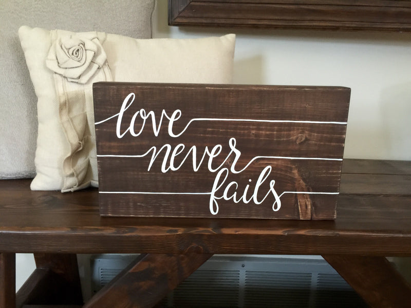 Love Never Fails Wood Block